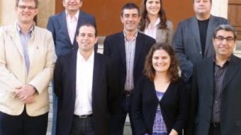 D'esquerra a dreta els candidats, Joan Adell, Benet Oliva, Xavier Yelo, Xavier Godàs, Laura Julià, Teia Àlvarez, Joan Alfons Cusidó i Francesc Solà X.A
