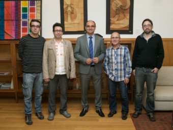 El rector Palomar, amb el president d'Escola Valenciana. EL PUNT AVUI