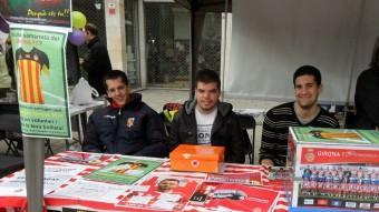 Voluntaris en un acte promocional del Girona Girona FC