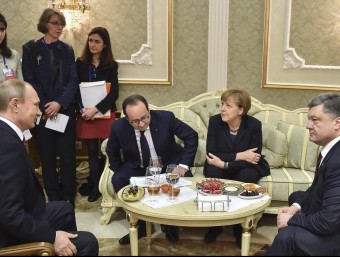 Putin, Merkel, Hollande i Poroshenko, durant la cimera d'aquest dimecres a Minks REUTERS