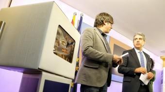 Carles Puigdemont i Francesc Homs , ahir, a la seu de CDC ANDREU PUIG