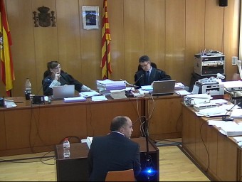 Figueiredo , al centre, durant la seva declaració com a acusat durant el judici celebrat al desembre ARXIU / ACN