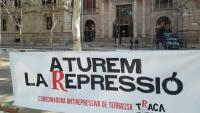Pancarta en contra la repressió en un judici a un activista de Terrassa